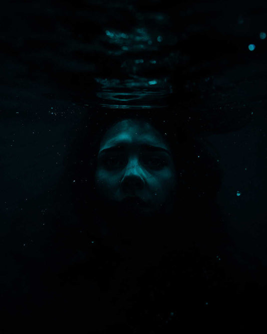 Distorted anonymous female figure floating underwater for psychological thriller cover. Noir ilustration. Noir novel.